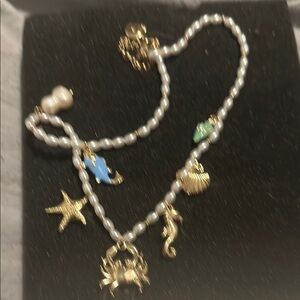 Gold and Pearl Charm Necklace